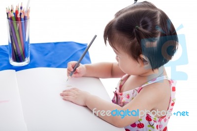 Girl Drawing Picture Stock Photo