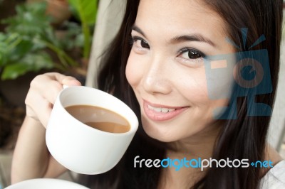 Girl Drinking Coffee Stock Photo