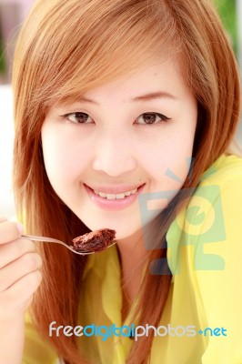 Girl Eating Food Stock Photo