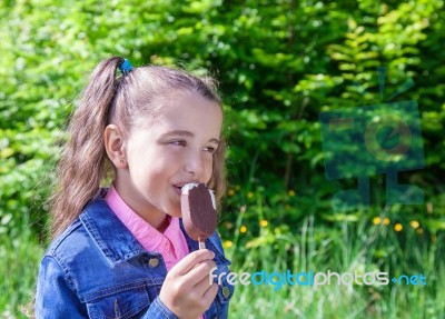 Girl Eating Ice Cream Stock Photo