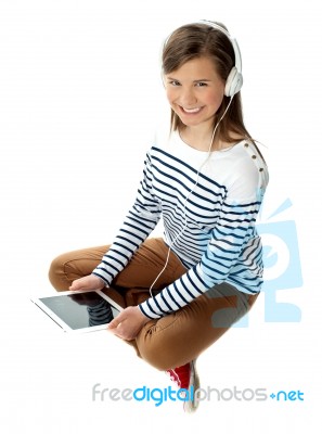 Girl Enjoying Music On Headphones Stock Photo