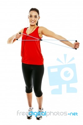 Girl Exercising With Elastic Fitness Band Stock Photo