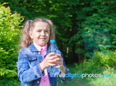 Girl Holding A Water Bottle Stock Photo