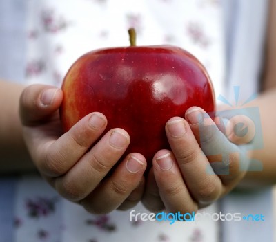 Girl Holding Apple Stock Photo