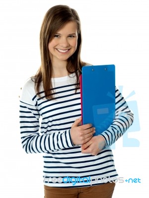 Girl Holding Documents And Posing Stock Photo