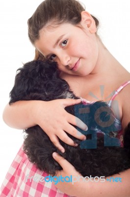 Girl Holding Dog Stock Photo