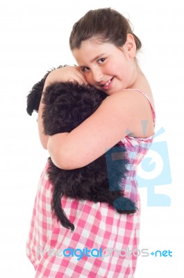 Girl Holding Dog Stock Photo