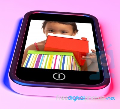 Girl Holding Gift Box On Screen Stock Image