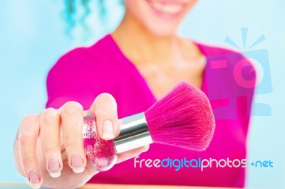 Girl Holding Powder Brush, Focus On Brush Stock Photo