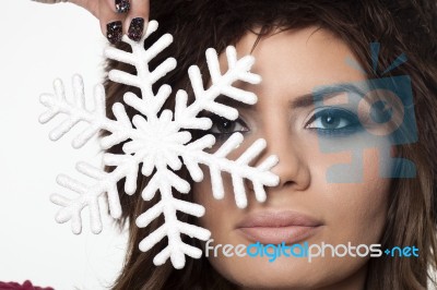 Girl Holding Snowflake Stock Photo