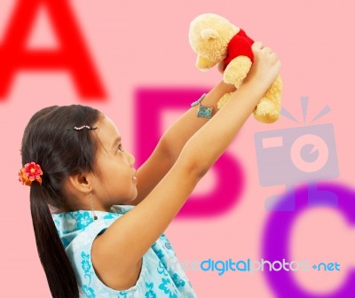 Girl Holding Teddy Bear Stock Photo