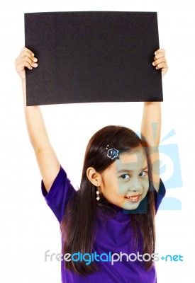 Girl Holding Up Blank Board Stock Photo