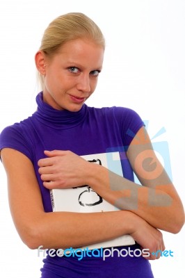 Girl Hugging Book Stock Photo