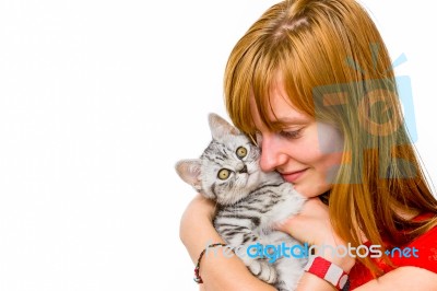 Girl Hugging Young Silver Tabby Cat Stock Photo