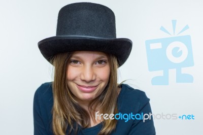 Girl In Black Wearing Top Hat Stock Photo