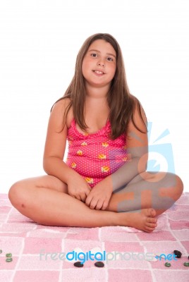 Girl In Swimsuit At The Beach Stock Photo