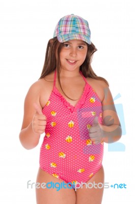 Girl In Swimsuit Showing Thumbs Up Stock Photo