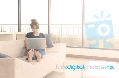 Girl In The Living Room With Warm Light Stock Photo