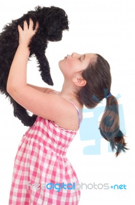 Girl Kissing Dog Stock Photo