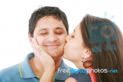 Girl Kissing To Her Lover Stock Photo