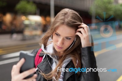 Girl  Listening To Music And Take Selfie Stock Photo