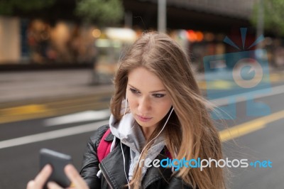 Girl  Listening To Music And Take Selfie Stock Photo