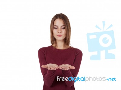 Girl Looking At Her Hands Stock Photo