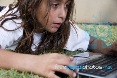 Girl Looking At Notebook Stock Photo