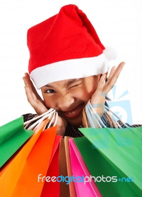 Girl On Christmas Shopping Spree Stock Photo