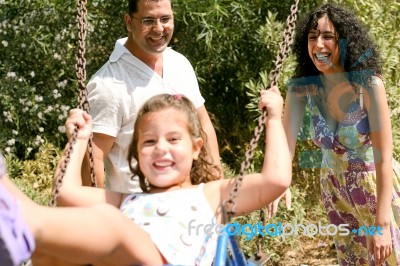 Girl On Swing Stock Photo