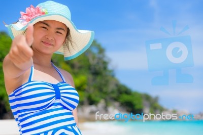 Girl On The Beach At Thailand Stock Photo