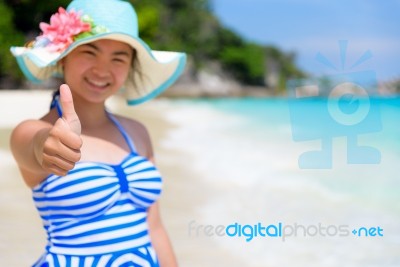 Girl On The Beach At Thailand Stock Photo