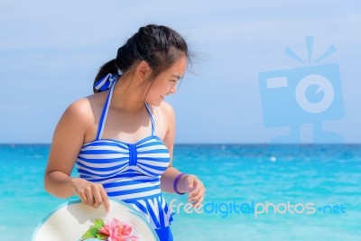 Girl On The Beach At Thailand Stock Photo