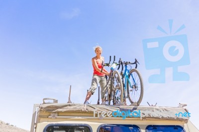 Girl On The Roof Of The Truck Stock Photo