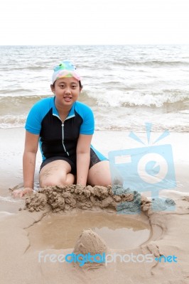 Girl Playing On Sea Beach Stock Photo