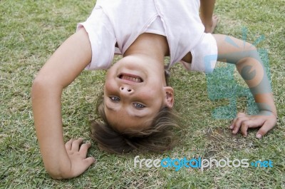 Girl Playing Outside Stock Photo