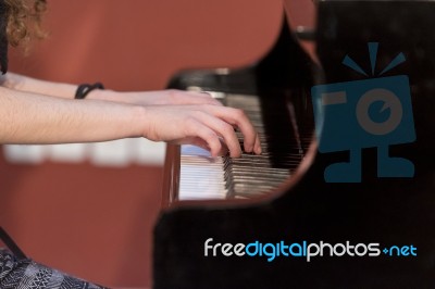 Girl Plays Piano Stock Photo