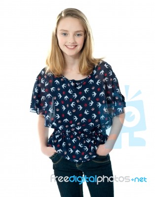 Girl Posing With Hands In Pocket Stock Photo