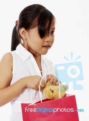 Girl Receiving Birthday Gift Stock Photo