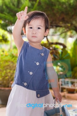 Girl Relaxing In The Backyard. Outdoor Shot Stock Photo