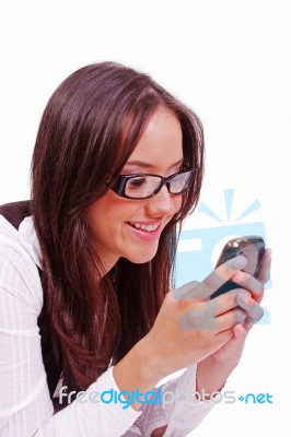 Girl Sending Text Sms At Cell Phone Stock Photo