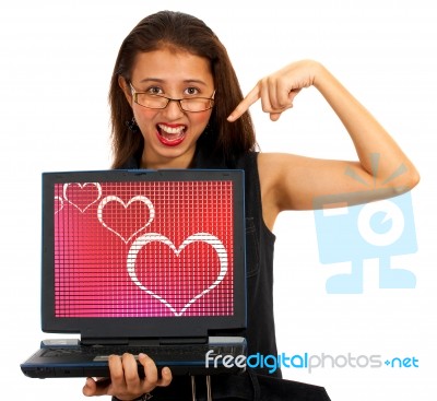 Girl Showing Hearts On Laptop Stock Photo