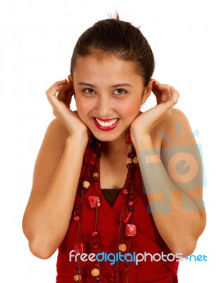 Girl Smiling Closing Ears Stock Photo