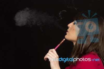 Girl Smoking A Electronic Cigarette Stock Photo