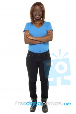 Girl Standing With Crossed Arms Stock Photo