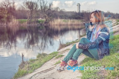 Girl Talking To  Phone Stock Photo