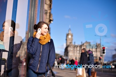 Girl Talks On Phone Stock Photo