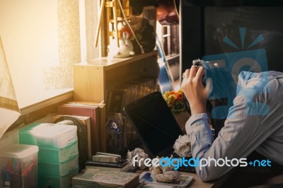 Girl Was Stressed On The Table Stock Photo