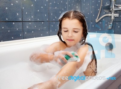 Girl Washing Her Hand In The Bath Stock Photo