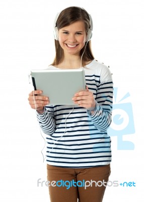 Girl Watching iPad Stock Photo